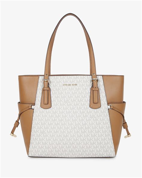 michael kors monogram tote vanilla|Michael Kors canvas tote.